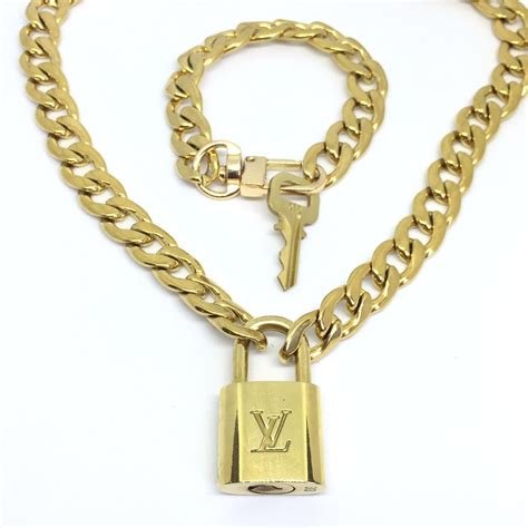 louis vuitton lock chain gold|louis vuitton cuban chain.